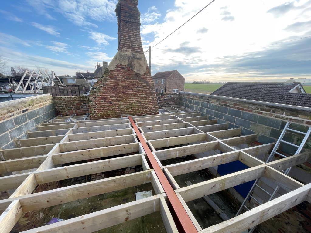 Lot: 58 - COTTAGE RENOVATION PROJECT WITH PLANNING IN VILLAGE LOCATION - View from the staircase looking at the chimney